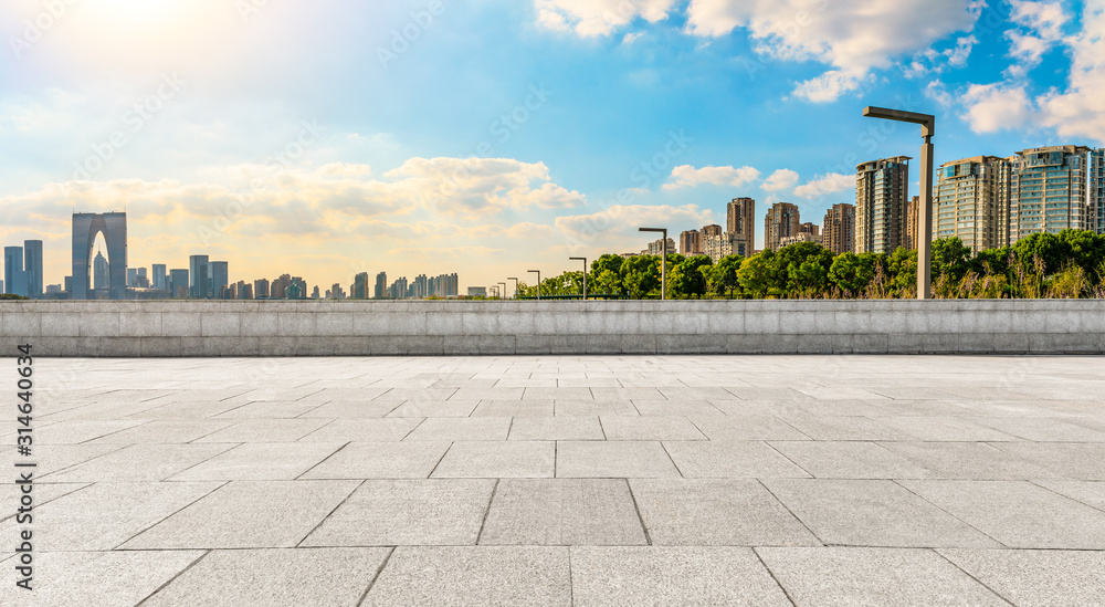 Empty square road and beautiful city skyline in Suzhou