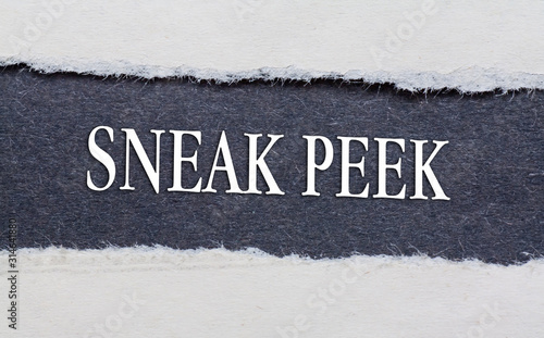 Bilde på lerret Rip Blue Paper and white background with written sneak peek words