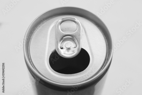 Close up of aluminum can on a top view, soda can white and black. Open can.
