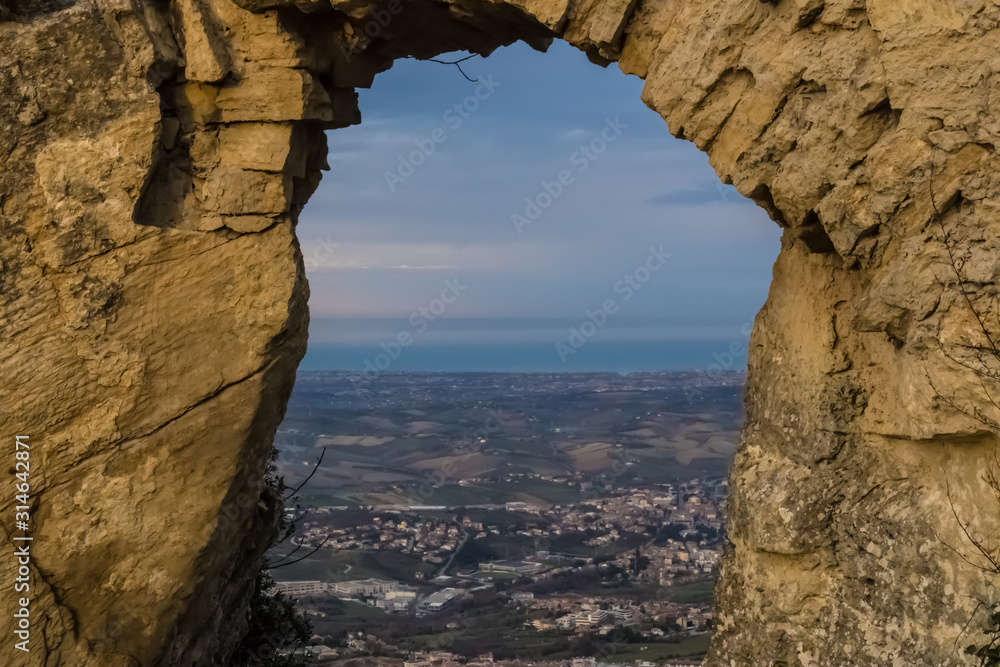 View through the natural rock frame on San Marino landscape - Image