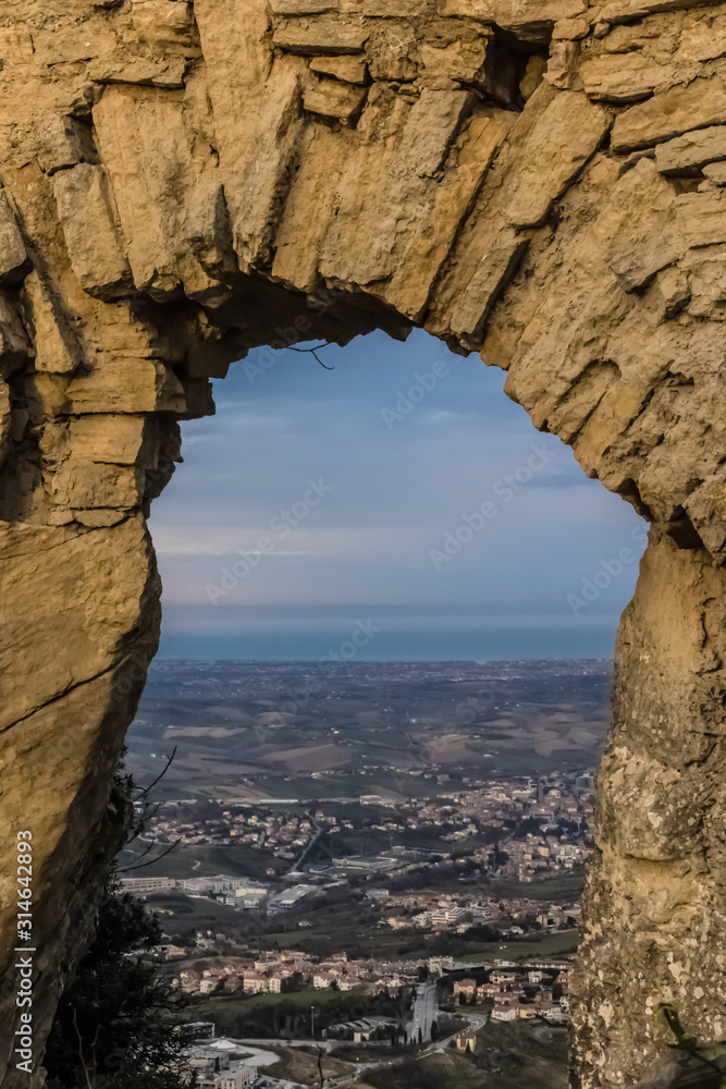 Vertical view through the natural rock frame on San Marino landscape - Image