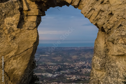 View through the natural rock frame on San Marino landscape - Image