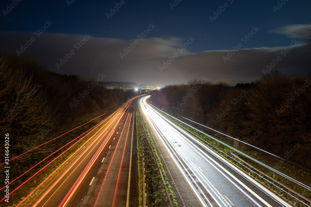 Long exposure and light trails of a highway at night Long exposure and light trails of a highway at night
