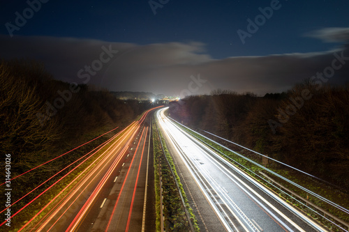 Long exposure and light trails of a highway at night