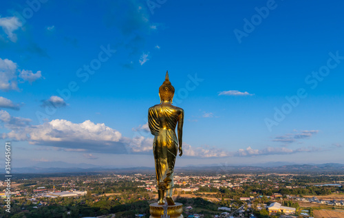 behide the buddha status looking at the city