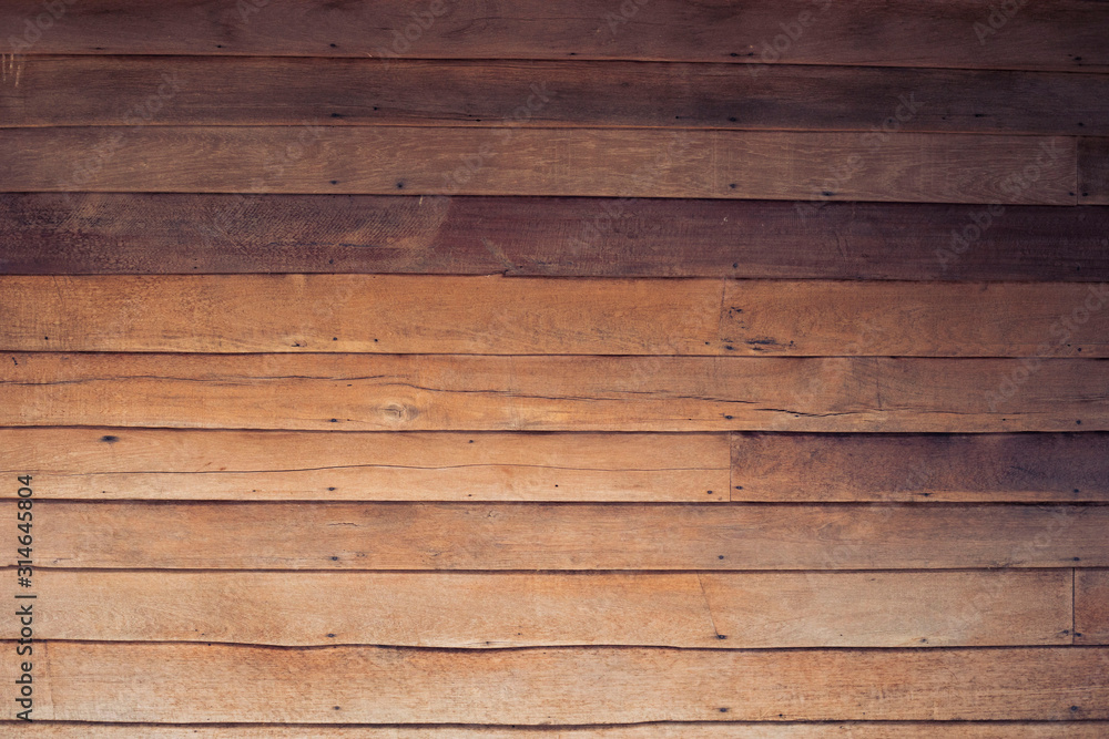 Old wooden background, wooden house wall, traditional Thai house details, Laos Old wooden background, wooden house wall, traditional Thai house details, Laos