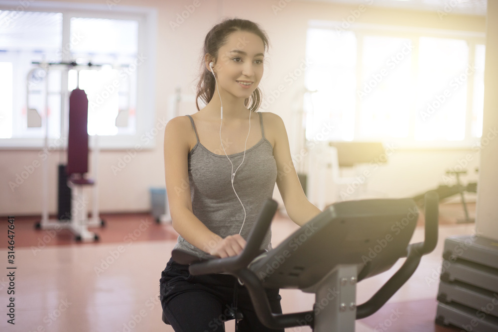 Fitness woman exercising crossfit. View of beautiful young woman training. Fitness woman exercising crossfit. View of beautiful young woman training.