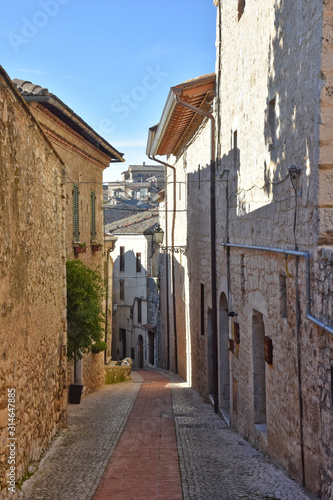 Veroli, Italy, 01/03/2020. A narrow street between the old houses of a medieval village