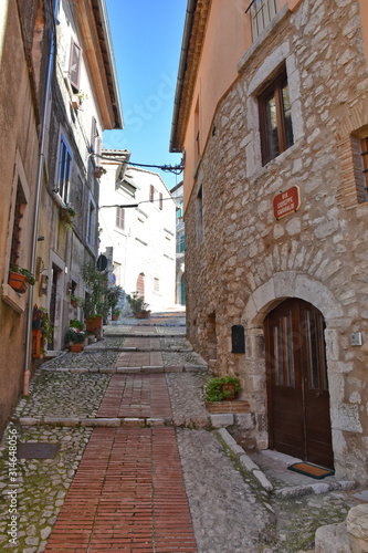 Veroli, Italy, 01/03/2020. A narrow street between the old houses of a medieval village © Giambattista
