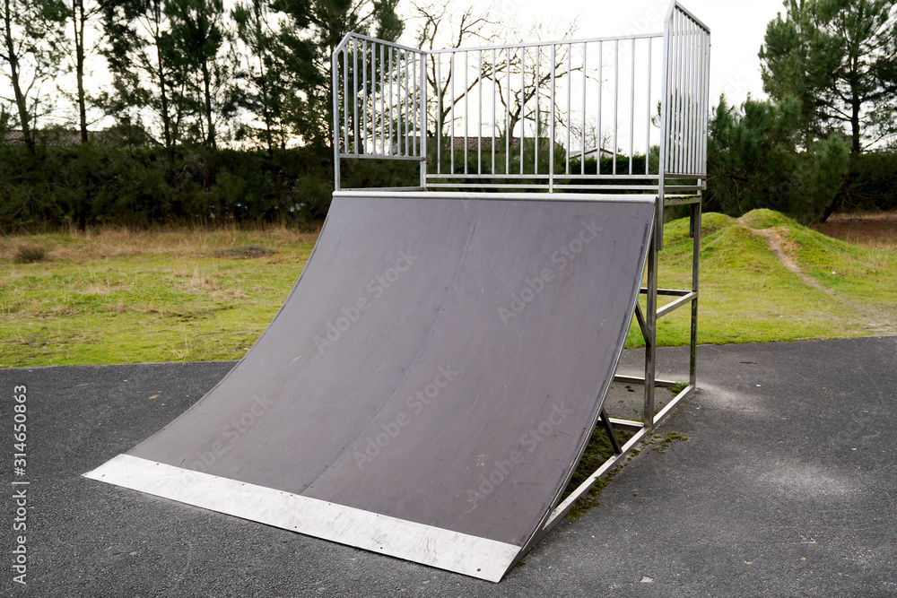 Quarter pipe ramp playground for skate practicing skateboarding adventure  sport in public park Stock Photo | Adobe Stock