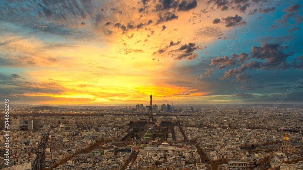 Paris skyline with Eiffel Tower at sunset in Paris