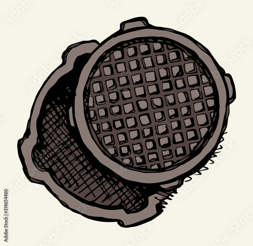 Round manhole cover. Vector drawing