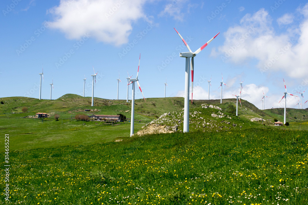 Fototapeta premium Turbines to produce wind energy, new ecofriendly production in Italy, Sicily