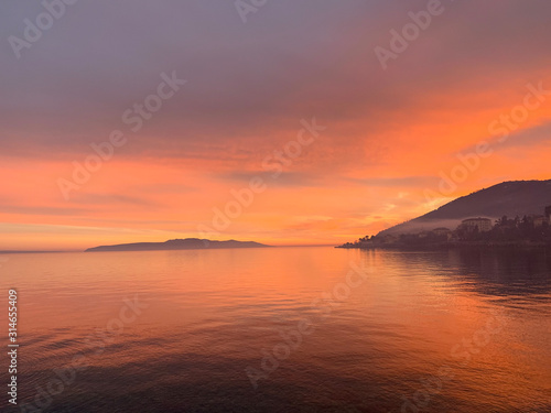 Beautiful sunset by the sea, natural colors © Oksana