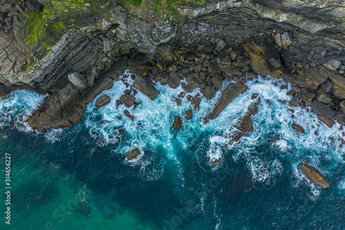 Detail of sea waves colors breaking in the coast of Lekeitio  Basque country