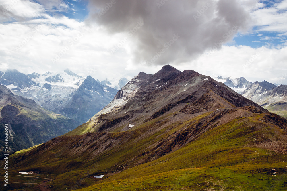 Corne de Sorebois (2.896m - 9.501ft) in the Pennine Alps on a cloudy summer day. Zinal, Anniviers, Valais, Switzerland