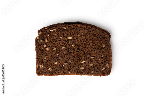 Dark rye bread with sunflower seeds isolated on white background.