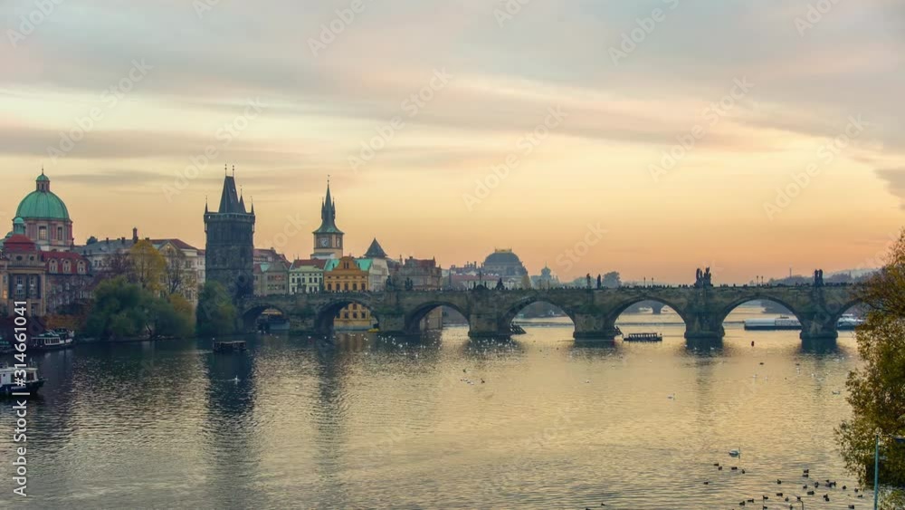 Time-lapse of Prague with Vitava river and city skyline, with the famous Charles Bridge. Prague, Czech Republic. Time-lapse of Prague with Vitava river and city skyline, with the famous Charles Bridge. Prague, Czech Republic.