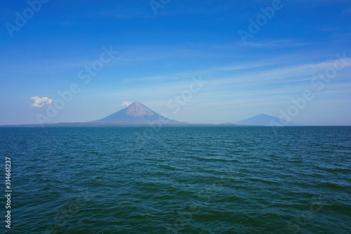 Insel Ometepe in Nikaragua mit zwei Vulkanen Concepción bei blauem Himmel photo