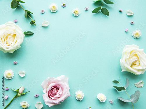 Flowers composition on green background