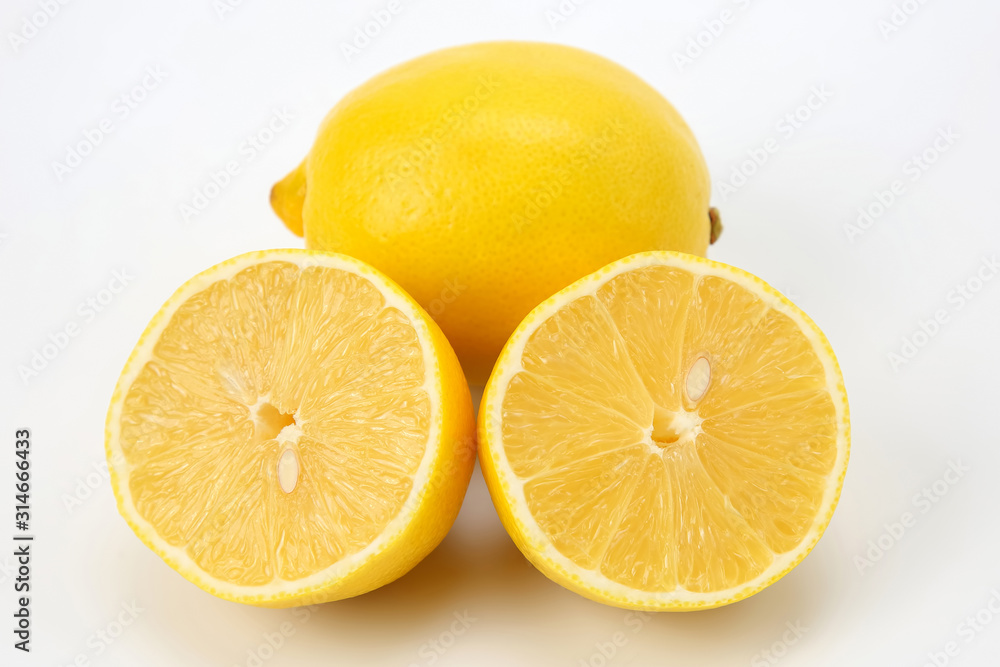 Cut citrus fruit of  lemon on white background