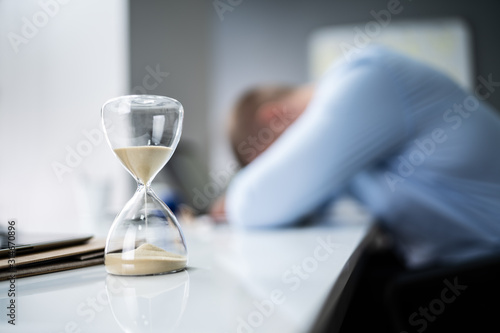Exhausted Working Under Time Pressure