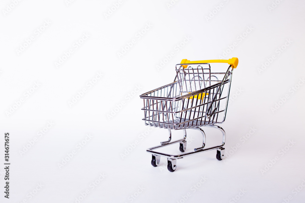 Shopping cart concept of shopping and sales, retail and shops. Shopping cart concept of shopping and sales, retail and shops.