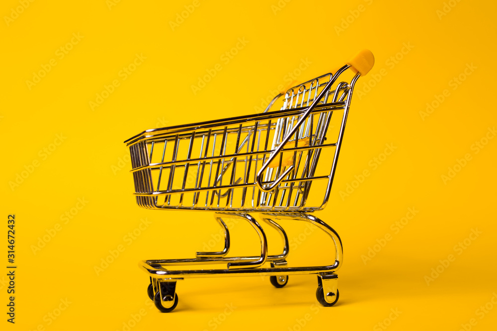 Shopping cart concept of shopping and sales, retail and shops. Shopping cart concept of shopping and sales, retail and shops.