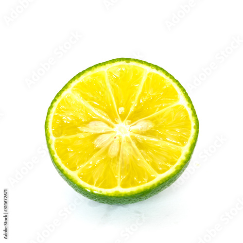 Slide cut lime isolated on white