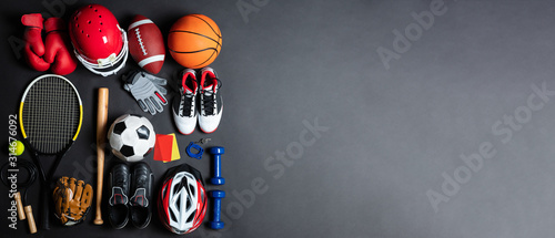 Fototapeta Naklejka Na Ścianę i Meble -  Variety Of Sports Equipment On Gray Background