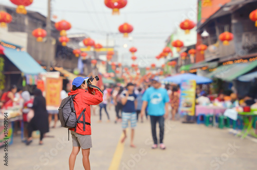 Photography Beautiful woman traveler take a picture.