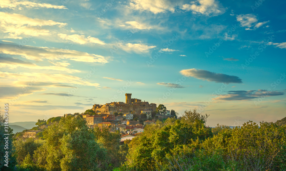 Capalbio medieval village skyline at sunset. Maremma, Tuscany Italy