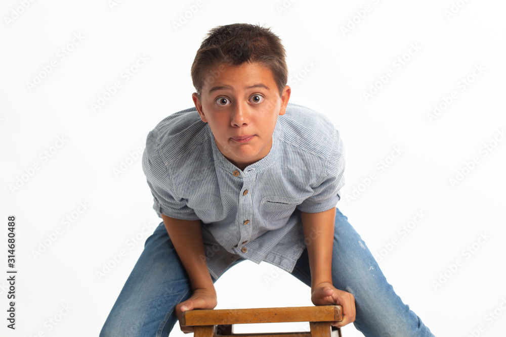 Obraz premium Young boy doing crazy photo session