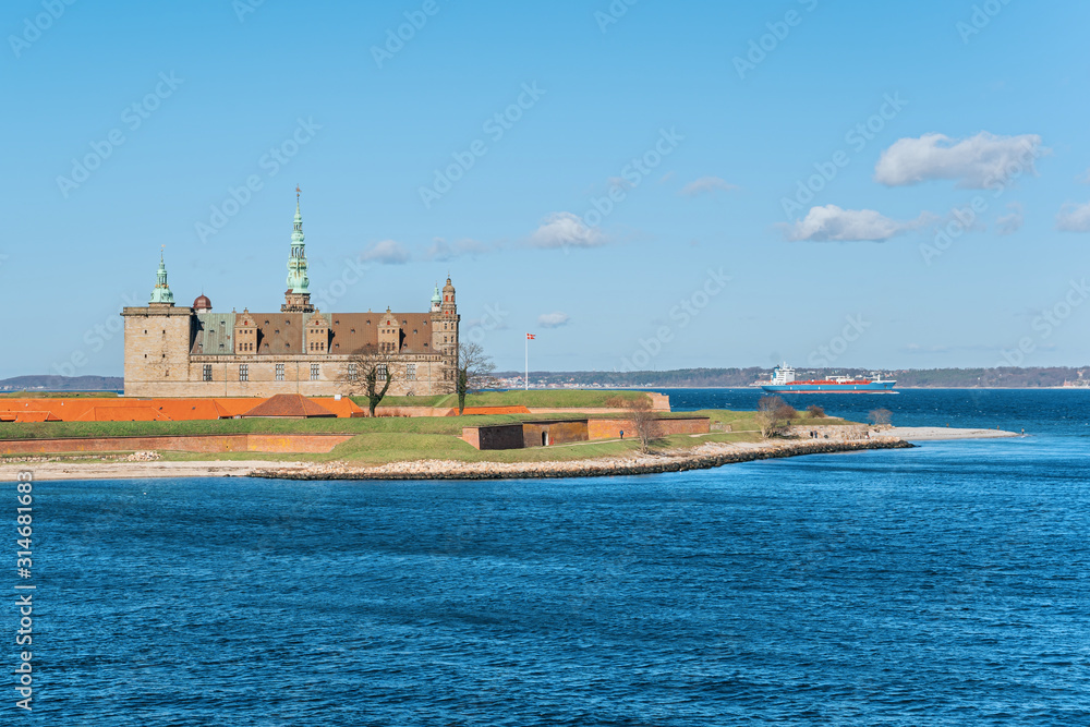Danish harbour of Helsingor with Kronborg castle in the backgroundin sunny day