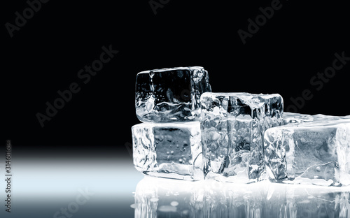 Crystal clear transparent shiny ice cubes, isolated on black background. © stone36