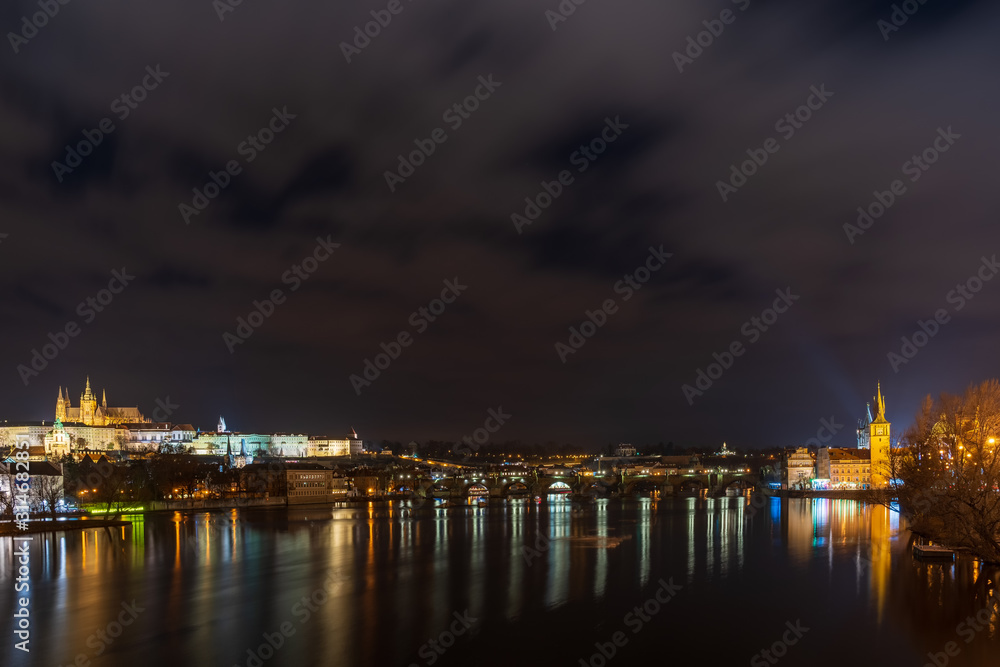 Prague castle and Charles bridge in the night, Czech republic wide view