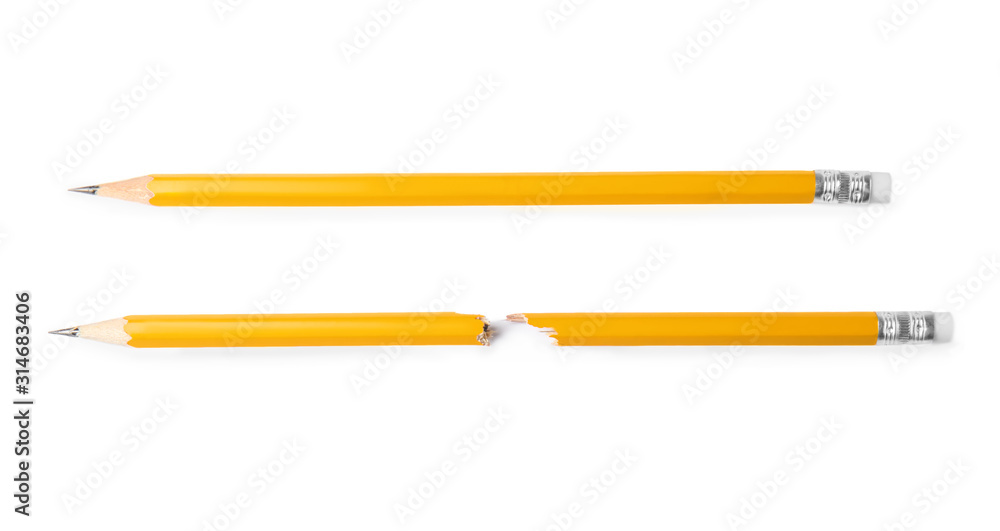 Broken and whole graphite pencils on white background, top view Broken and whole graphite pencils on white background, top view