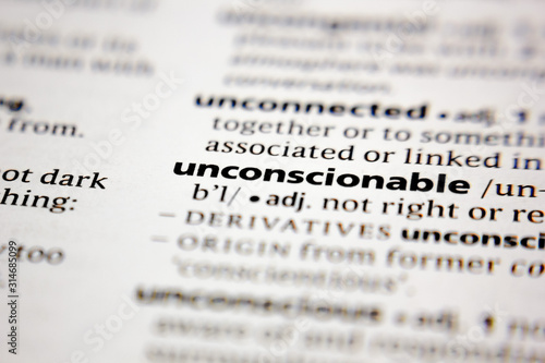 Foto Word or phrase unconscionable in a dictionary.