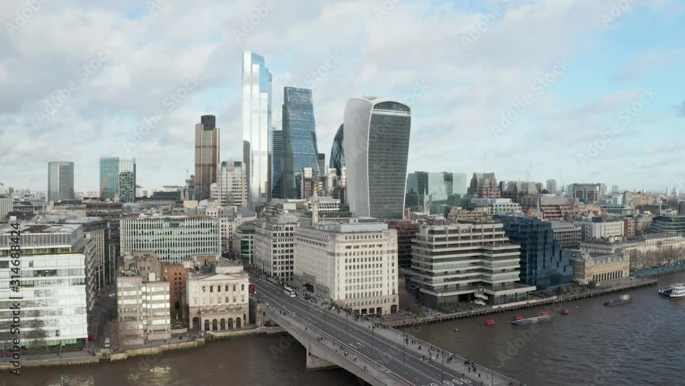 London city centre aerial panorama view: financial district, Thames river, Belfast, skyscrappers, warf and buildings and St. Pauls Cathedral, Tower Bridge and The Tower London city centre aerial panorama view: financial district, Thames river, Belfast, skyscrappers, warf and buildings and St. Pauls Cathedral, Tower Bridge and The Tower