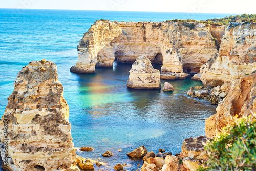Cliffs and ocean, Praia da Marinha, Algarve, Portugal photo