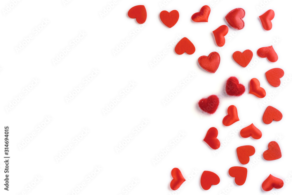 Festive composition from red hearts scattered and isolated on white background, valentines day concept