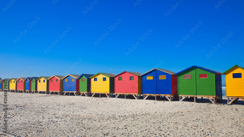 Fototapeta premium beach huts on the beach by muizenberg