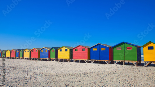 colorful beach huts on the beach at muizenberg © mschauer