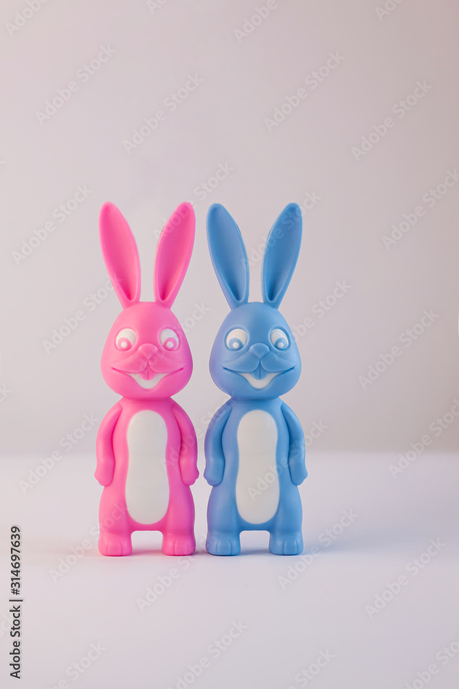 Cute bunnies, happy lovers couple together on light background, creative  Valentine's day card. Family love, relationship,dating concept. Easter  banner, wallpaper. Pink and blue rabbits. Minimal style. Stock Photo |  Adobe Stock