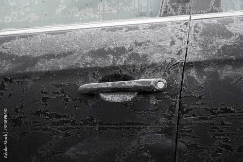 Fototapeta Naklejka Na Ścianę i Meble -  frozen car door lock isolated.