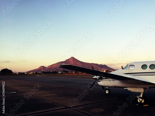 Aircraft in the Governor Valadares Airport Courtyard at Sunset