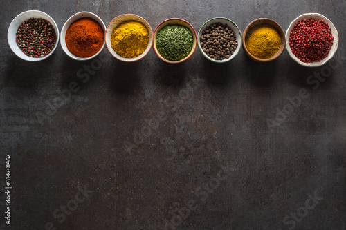 Set of variety aromatic spices and herbs in bowls © weyo