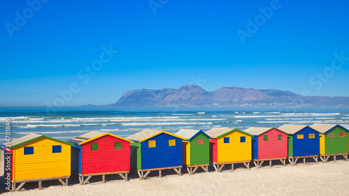 beach huts with mountains © mschauer