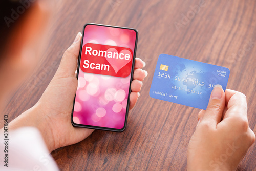 Businesswoman Making Payment On Mobile Phone photo