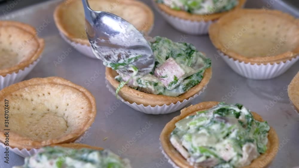 Pastry chef make Spinach Tart. Pastry chef make Spinach Tart.